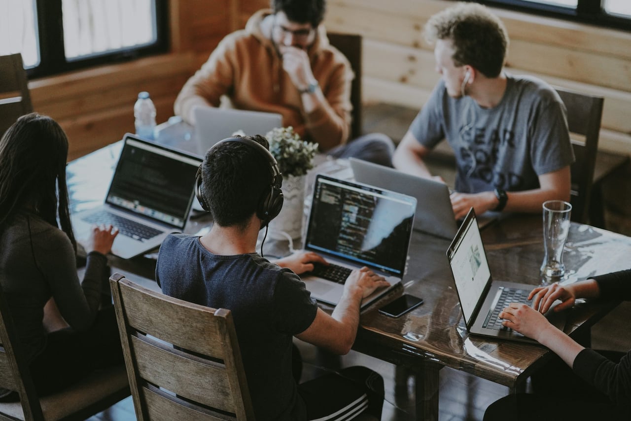 A team building and reviewing automated workflows together
