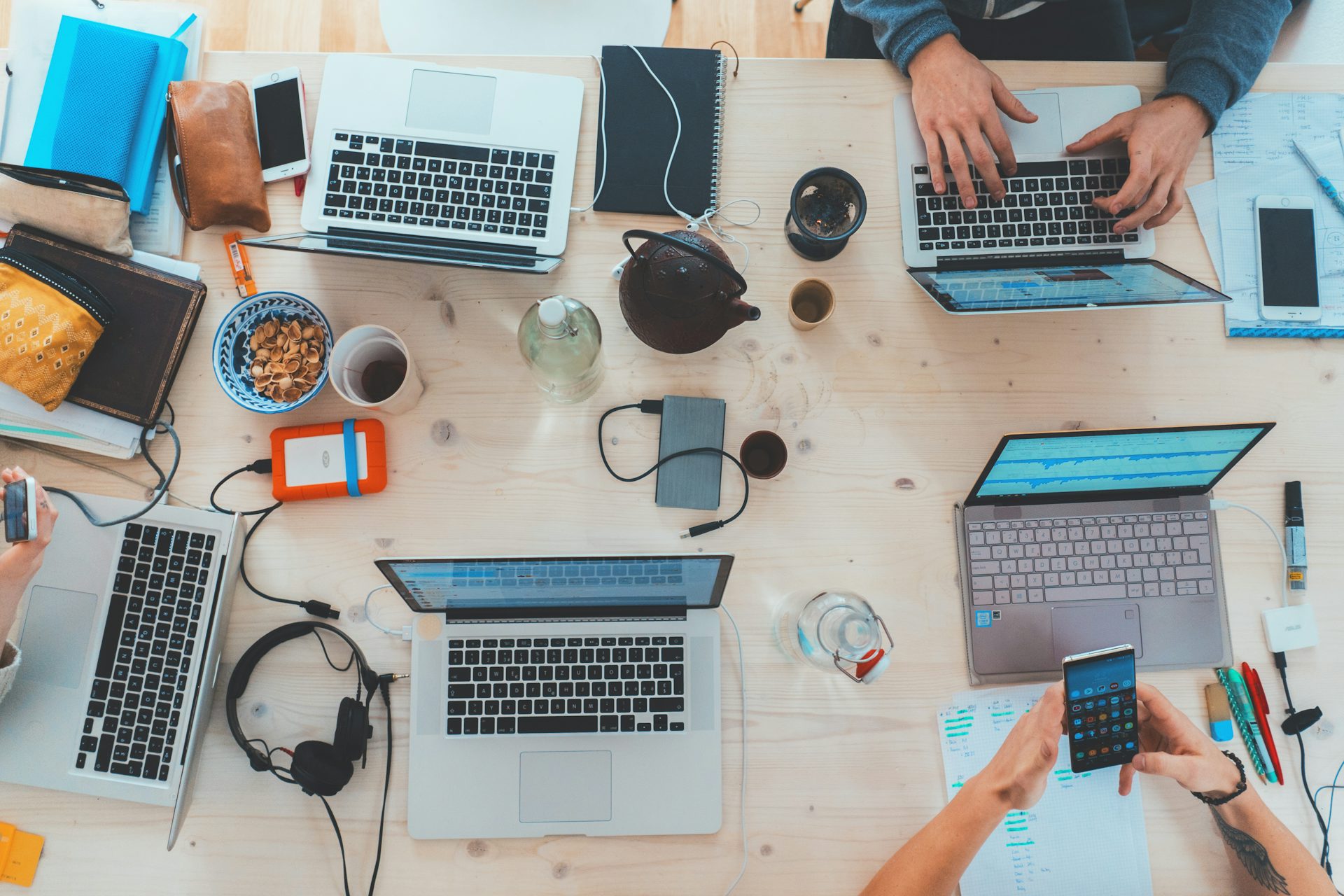 A workspace with devices and tools used to plan and publish marketing content